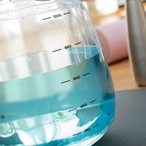 Kettlebell à remplir d'eau pour l'entraînement physique avec son Guide d'Exercices